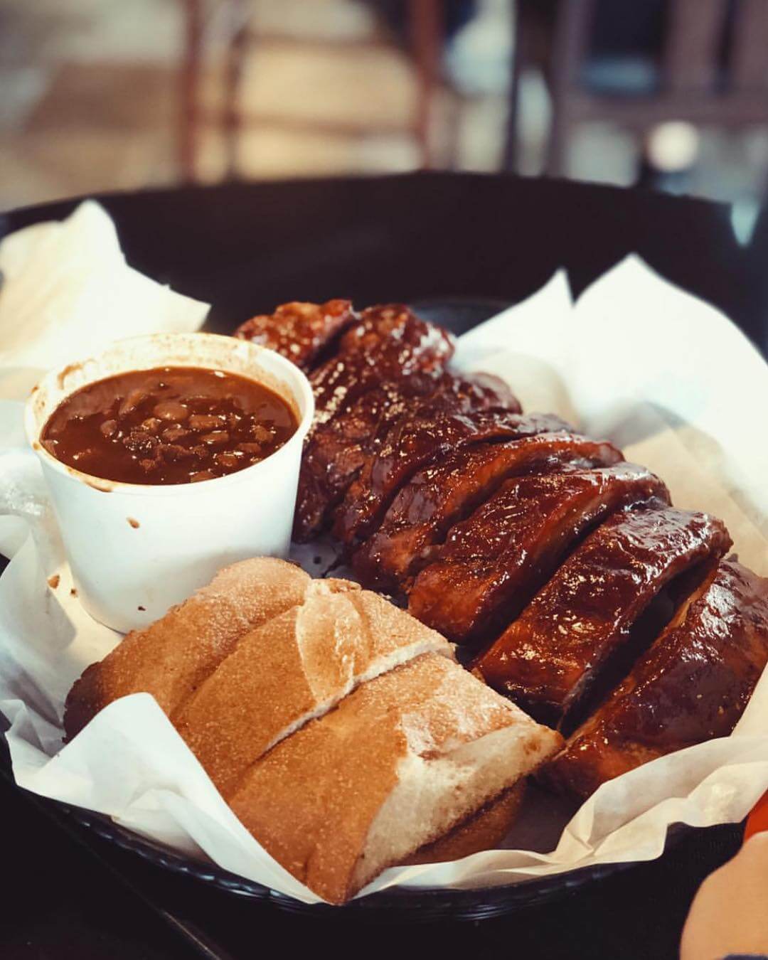 BBQ pork rib meal with beans and garlic bread from Firestone Grill in San Luis Obispo