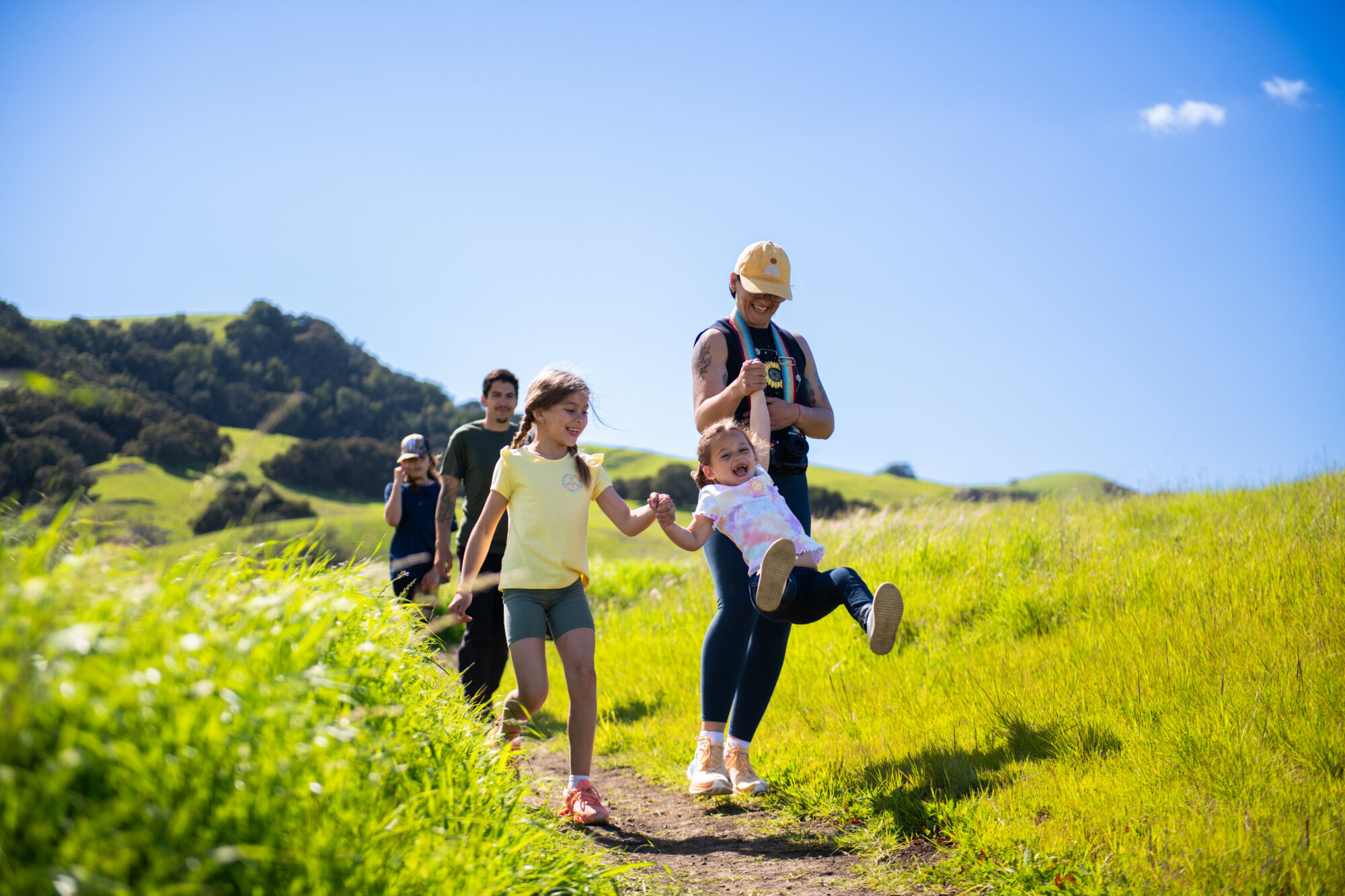 Family enjoying hike in SLO hills